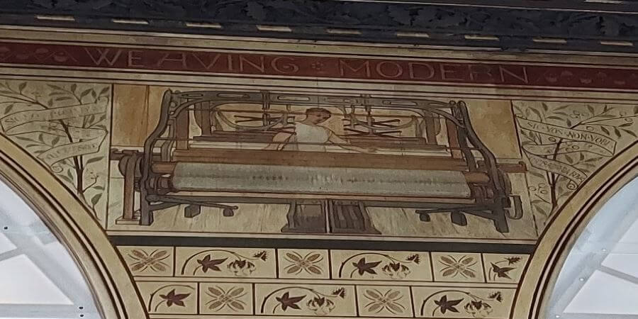 Tiles depicting a weaving loom inside Rochdale Town Hall.