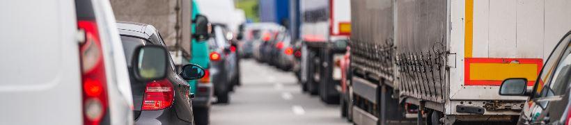 A long line of traffic stretching into the distance.