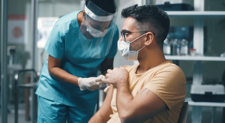 A patient receiving a vaccination.