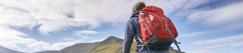 A hiker ascending a hill.