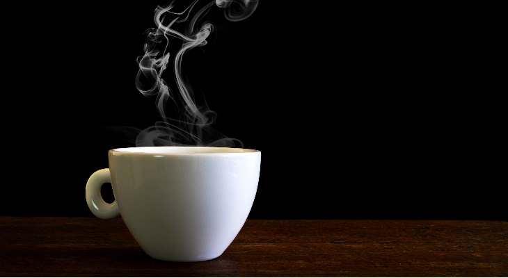 A steaming coffee cup.