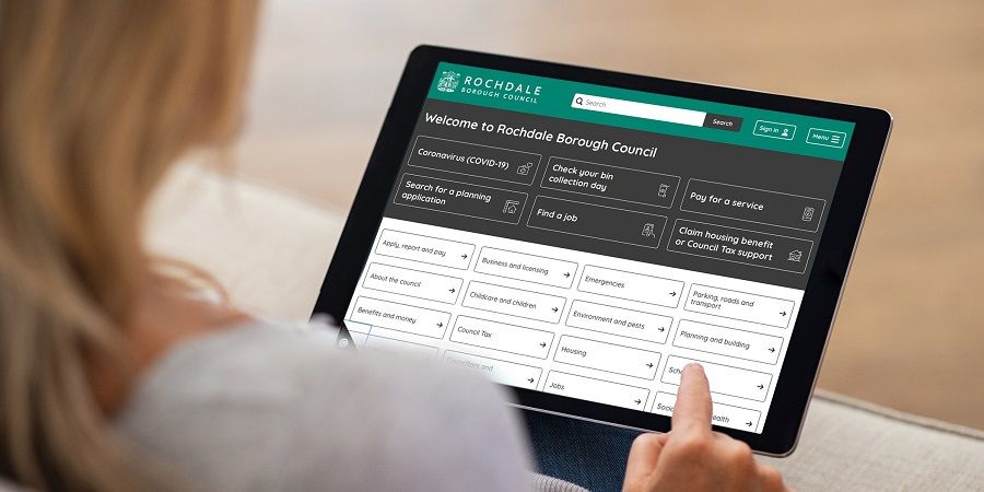 A person browsing Rochdale Borough Council's website on their tablet device.