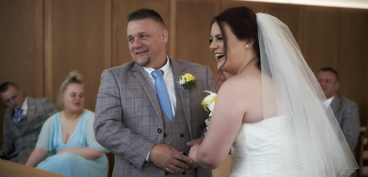 Bride and groom in wedding ceremony.