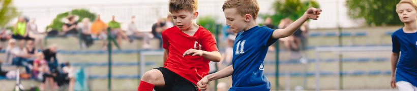 Children playing soccer.